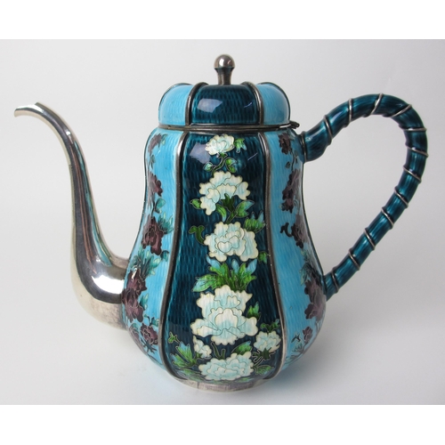 153 - An oriental white metal teapot