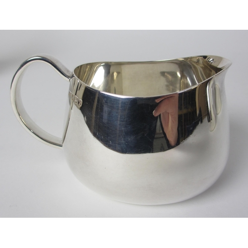 166 - A four piece silver tea service