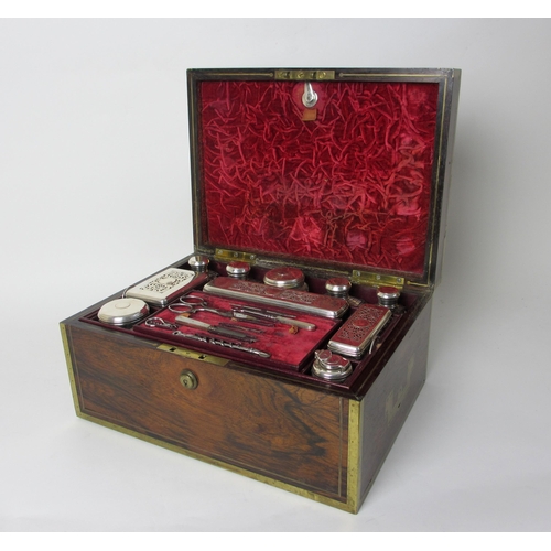 170 - A George IV brass mounted rosewood travel toilet case