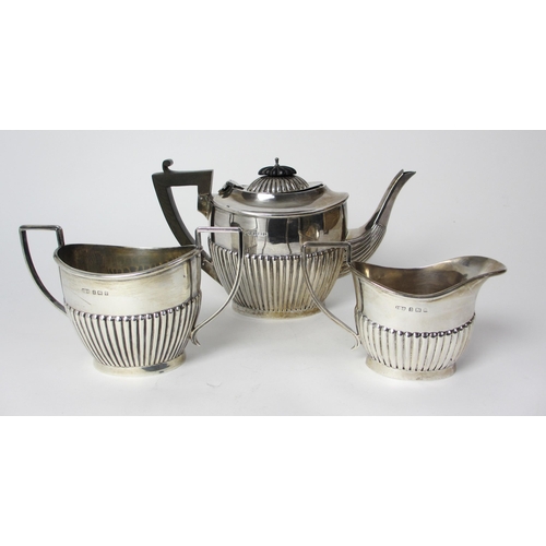 177 - A three piece silver tea service