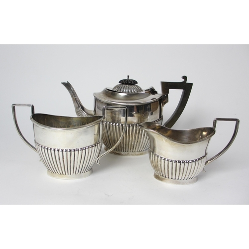 177 - A three piece silver tea service