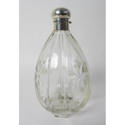 179 - A large silver topped glass scent bottle