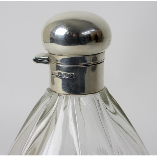 179 - A large silver topped glass scent bottle