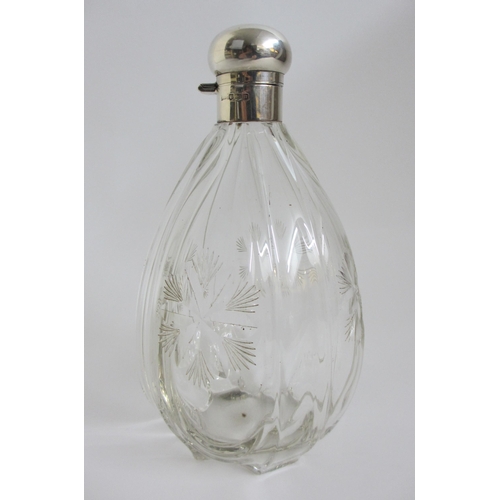 179 - A large silver topped glass scent bottle