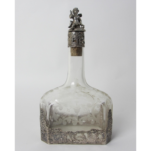 180 - A Continental silver overlaid etched glass decanter