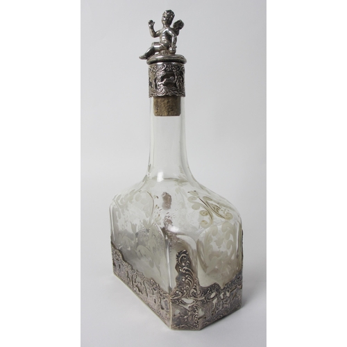 180 - A Continental silver overlaid etched glass decanter