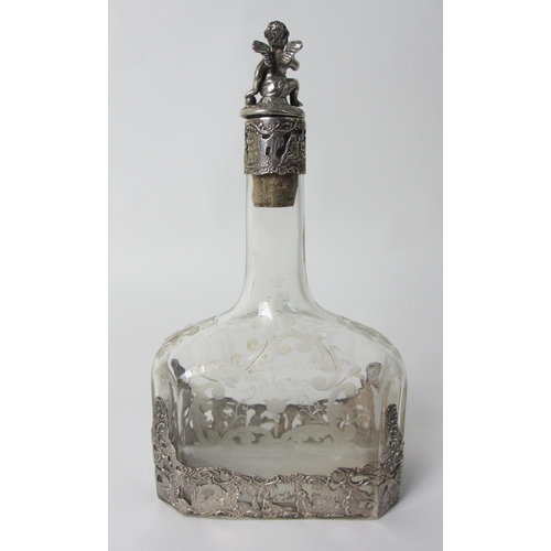 180 - A Continental silver overlaid etched glass decanter