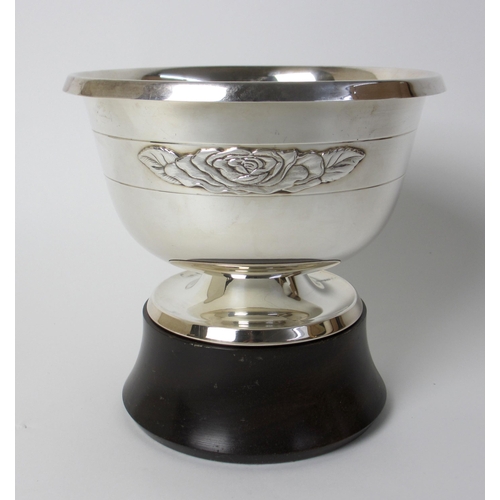 182 - A silver rosebowl on wood stand