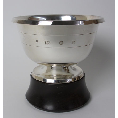 182 - A silver rosebowl on wood stand