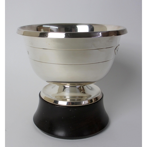 182 - A silver rosebowl on wood stand