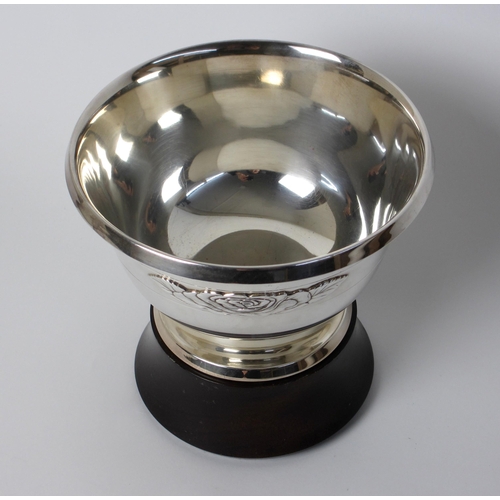 182 - A silver rosebowl on wood stand