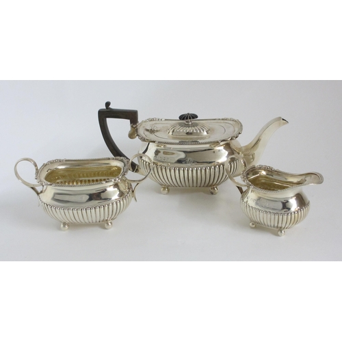 187 - A three piece silver tea service