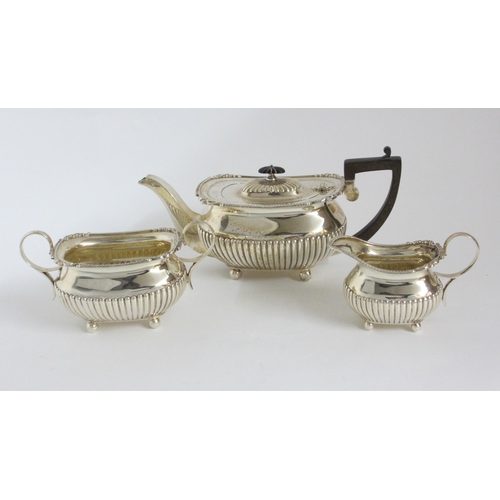 187 - A three piece silver tea service