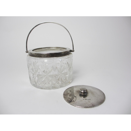 189 - A silver topped cut glass biscuit barrel