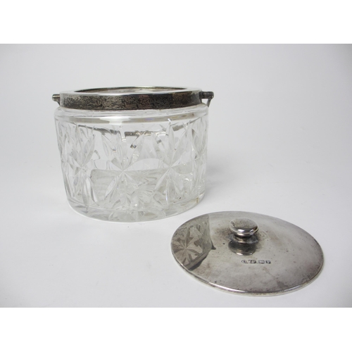 189 - A silver topped cut glass biscuit barrel