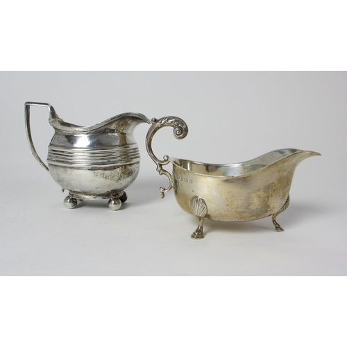 201 - A Georgian silver cream jug