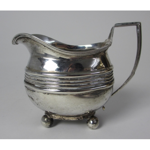 201 - A Georgian silver cream jug