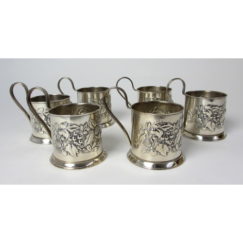 202 - A set of six white metal cup holders