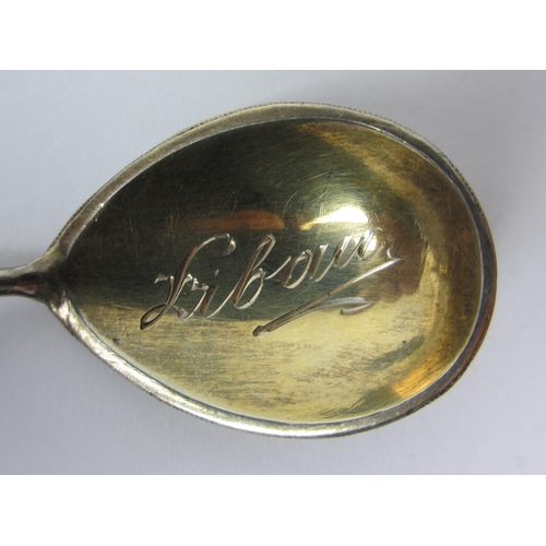 212 - A Russian silver gilt and cloisonne enamel table spoon