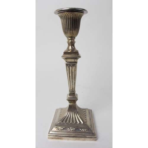 214 - A pair of Victorian silver candlesticks