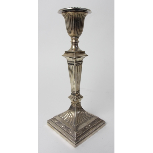 214 - A pair of Victorian silver candlesticks