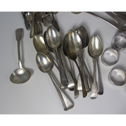 218 - A set of six silver soup spoons