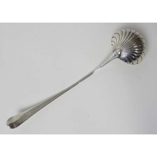 220 - A Georgian silver soup ladle