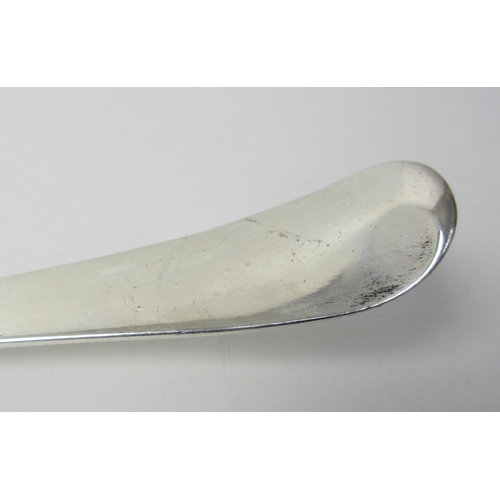 220 - A Georgian silver soup ladle