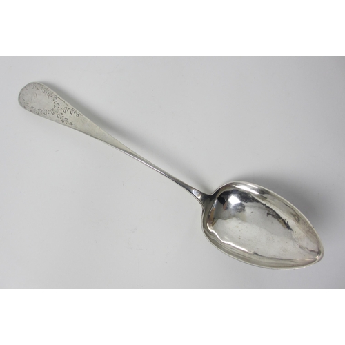 221 - A large white metal serving spoon