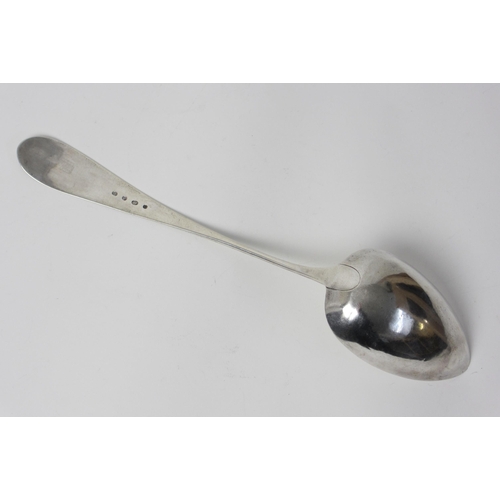 221 - A large white metal serving spoon