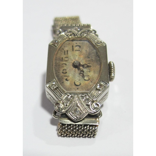 58 - A lady's Art Deco diamond wrist watch