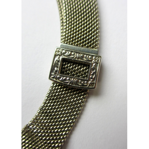 58 - A lady's Art Deco diamond wrist watch