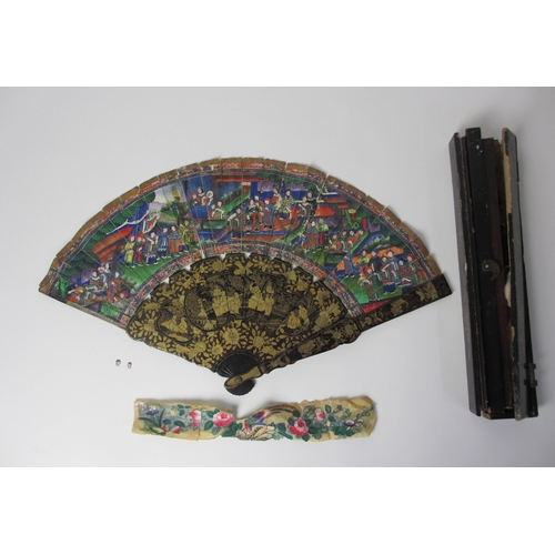 586 - A Chinese export painted and lacquered fan