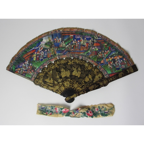 586 - A Chinese export painted and lacquered fan