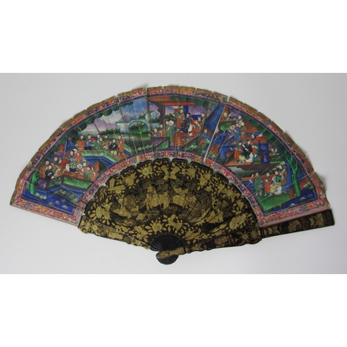 586 - A Chinese export painted and lacquered fan