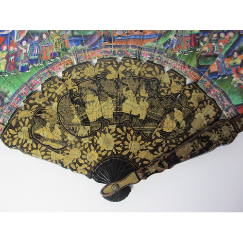 586 - A Chinese export painted and lacquered fan