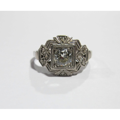 59A - An Art Deco platinum and diamond ring