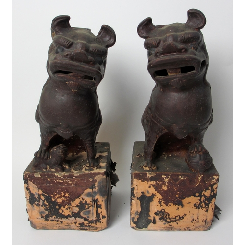 600 - A pair of painted terracotta joss stick holders