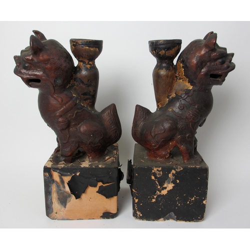 600 - A pair of painted terracotta joss stick holders