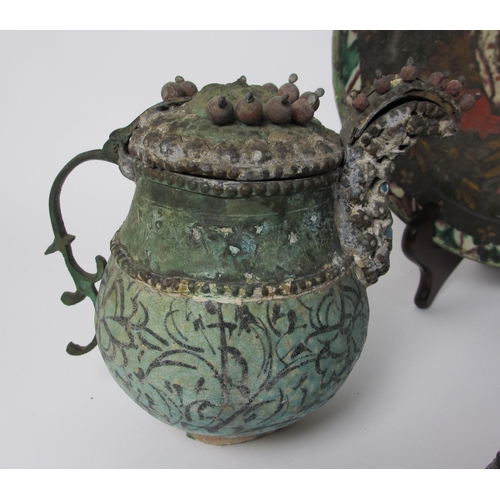 601 - An Indian polychrome jug with metal mounts