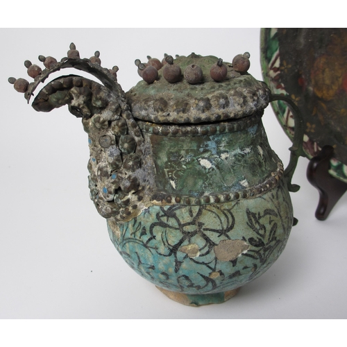 601 - An Indian polychrome jug with metal mounts