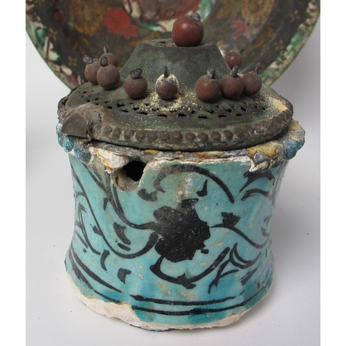 601 - An Indian polychrome jug with metal mounts