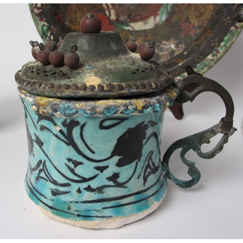 601 - An Indian polychrome jug with metal mounts