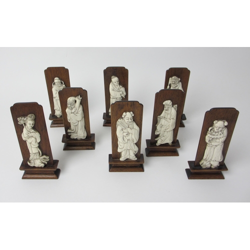 603 - A set of eight Chinese bone carved figures