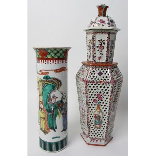 605 - A Chinese famille rose hexagonal reticulated and encased vase and cover