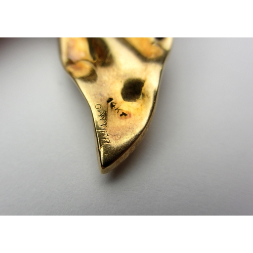 61 - A 14kt gold bow brooch