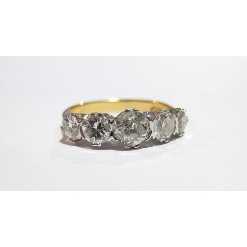 64 - A five stone diamond ring