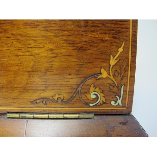 649 - A Victorian rosewood and inlaid stationary box