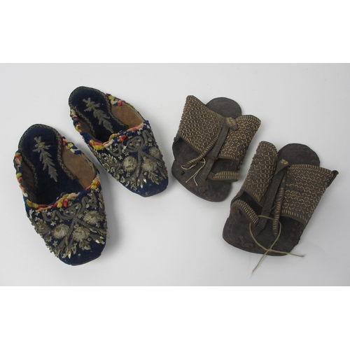 657 - A pair of leather and straw woven moccasins