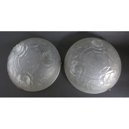 658 - A pair of Art Deco frosted and moulded glass plafonniers